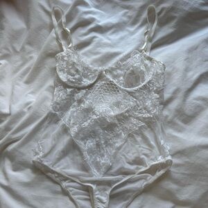 Elegant White Lace Bodysuit